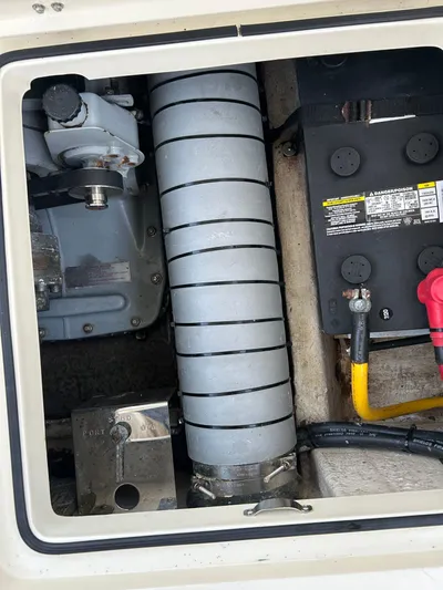  Yacht Photos Pics Engine compartment of a 2001 Hinckley Classic 36 Picnic Boat, showing mechanical components and wiring.