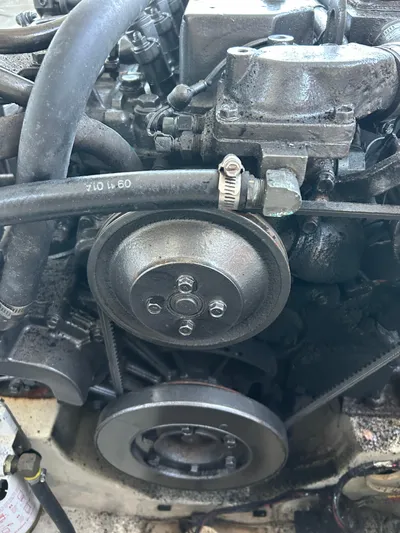  Yacht Photos Pics Engine of 2001 Hinckley Classic 36 Picnic Boat, showcasing mechanical components and hoses.