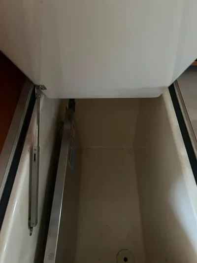  Yacht Photos Pics Storage compartment inside a 2001 Hinckley Classic 36 Picnic Boat.