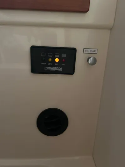  Yacht Photos Pics Control panel on a 2001 Hinckley Classic 36 Picnic Boat interior.