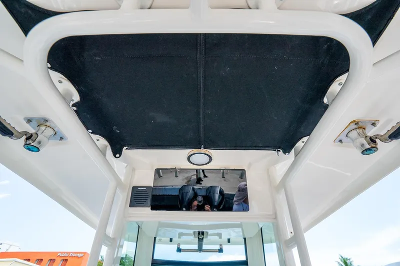 My Sherry III Yacht Photos Pics 2018 Boston Whaler 280 Outrage boat interior, featuring a sleek overhead design and modern fixtures.