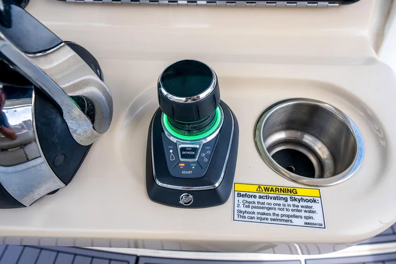 My Sherry III Yacht Photos Pics Control panel of 2018 Boston Whaler 280 Outrage with Skyhook joystick and warning label.