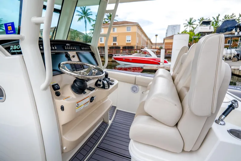 My Sherry III Yacht Photos Pics 2018 Boston Whaler 280 Outrage helm with luxurious seating and modern controls.