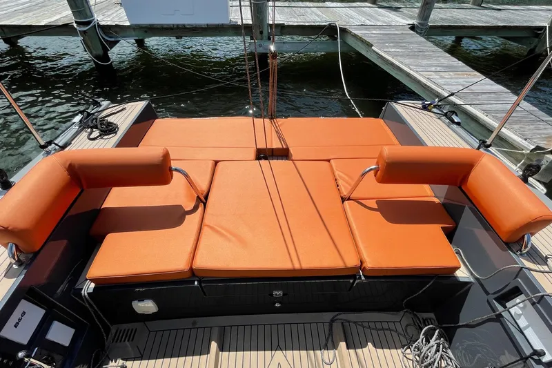 Saffire Yacht Photos Pics Luxury Saffier 33 Life yacht with orange cushioned seating, docked at marina, 2022 model.