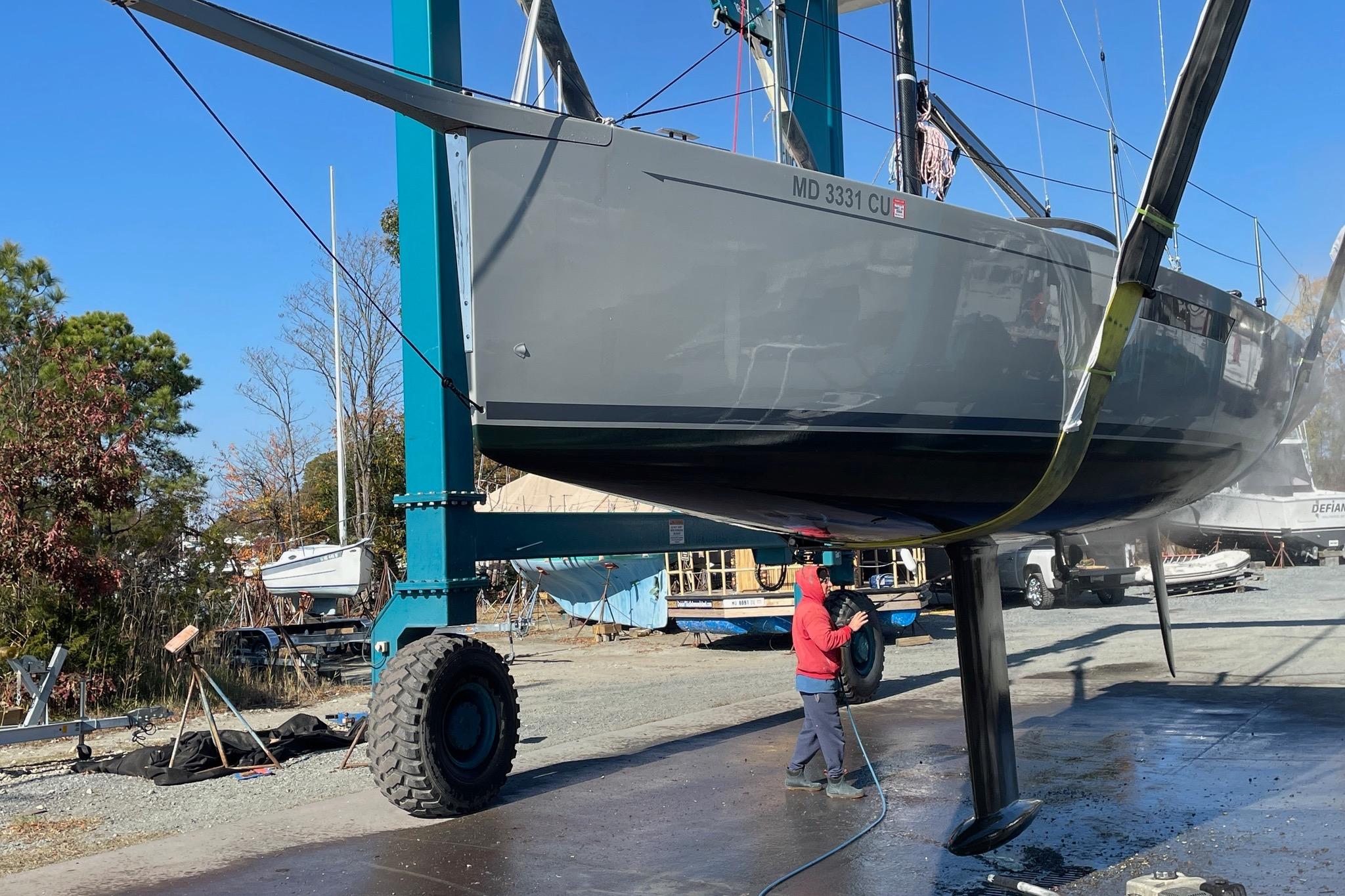 2022 Saffier 33 Life sailboat being cleaned at a boatyard.