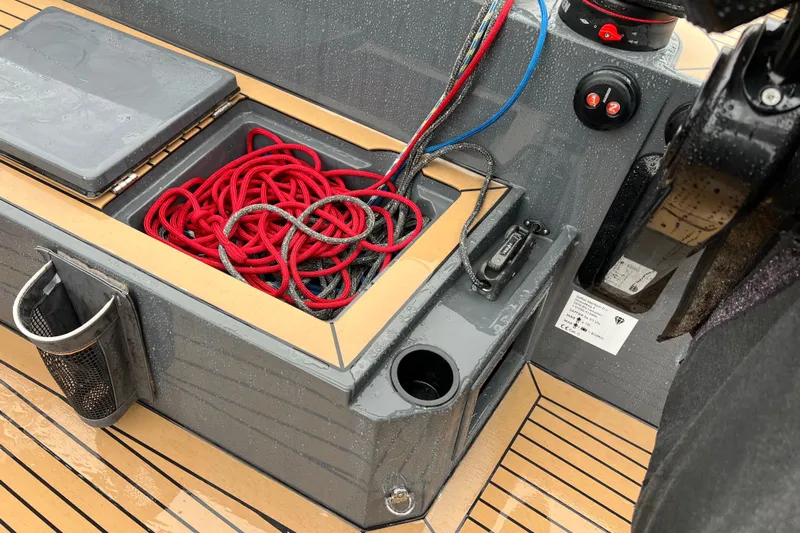Saffire Yacht Photos Pics Wet deck of 2022 Saffier 33 Life yacht with red ropes and control panel.
