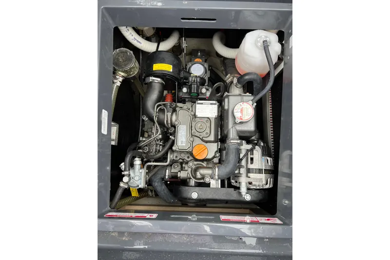 Saffire Yacht Photos Pics Engine compartment of a 2022 Saffier 33 Life sailboat, showcasing detailed components.