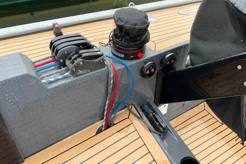 Saffire Yacht Photos Pics Close-up of 2022 Saffier 33 Life sailboat deck with winch and control lines.