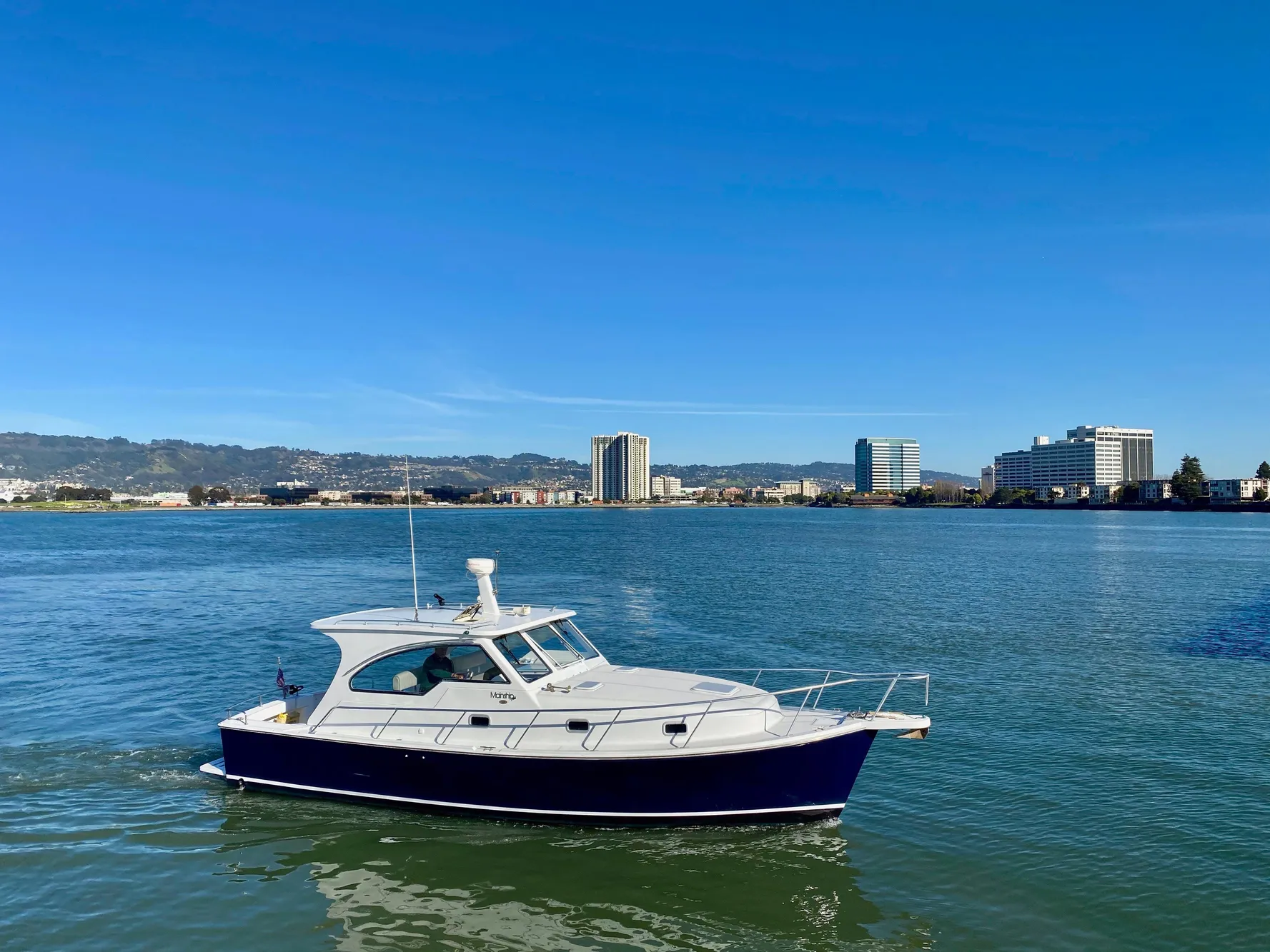 2000 Mainship Pilot 34 boat on calm water.