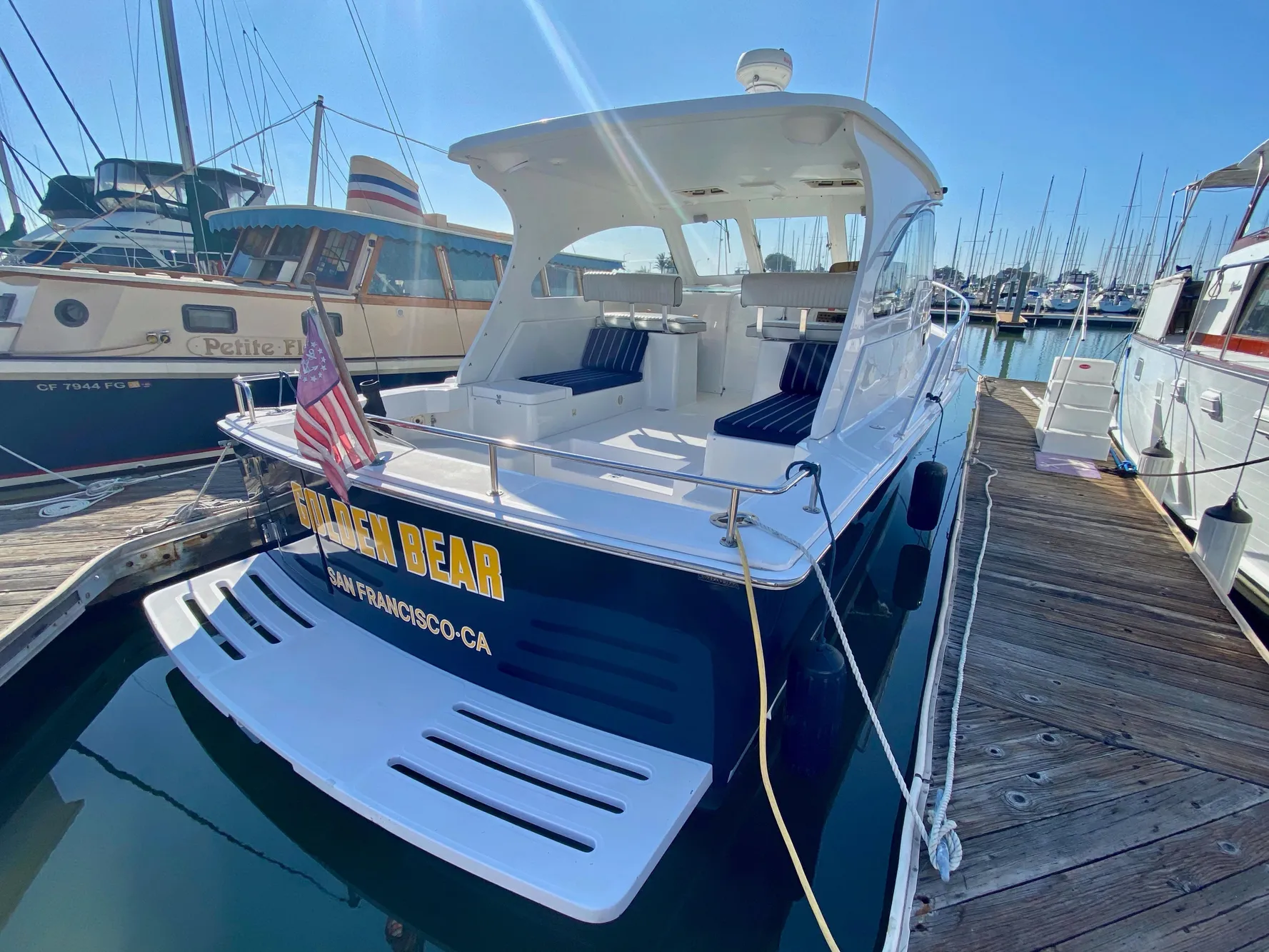 2000 Mainship Pilot 34 boat docked at marina.