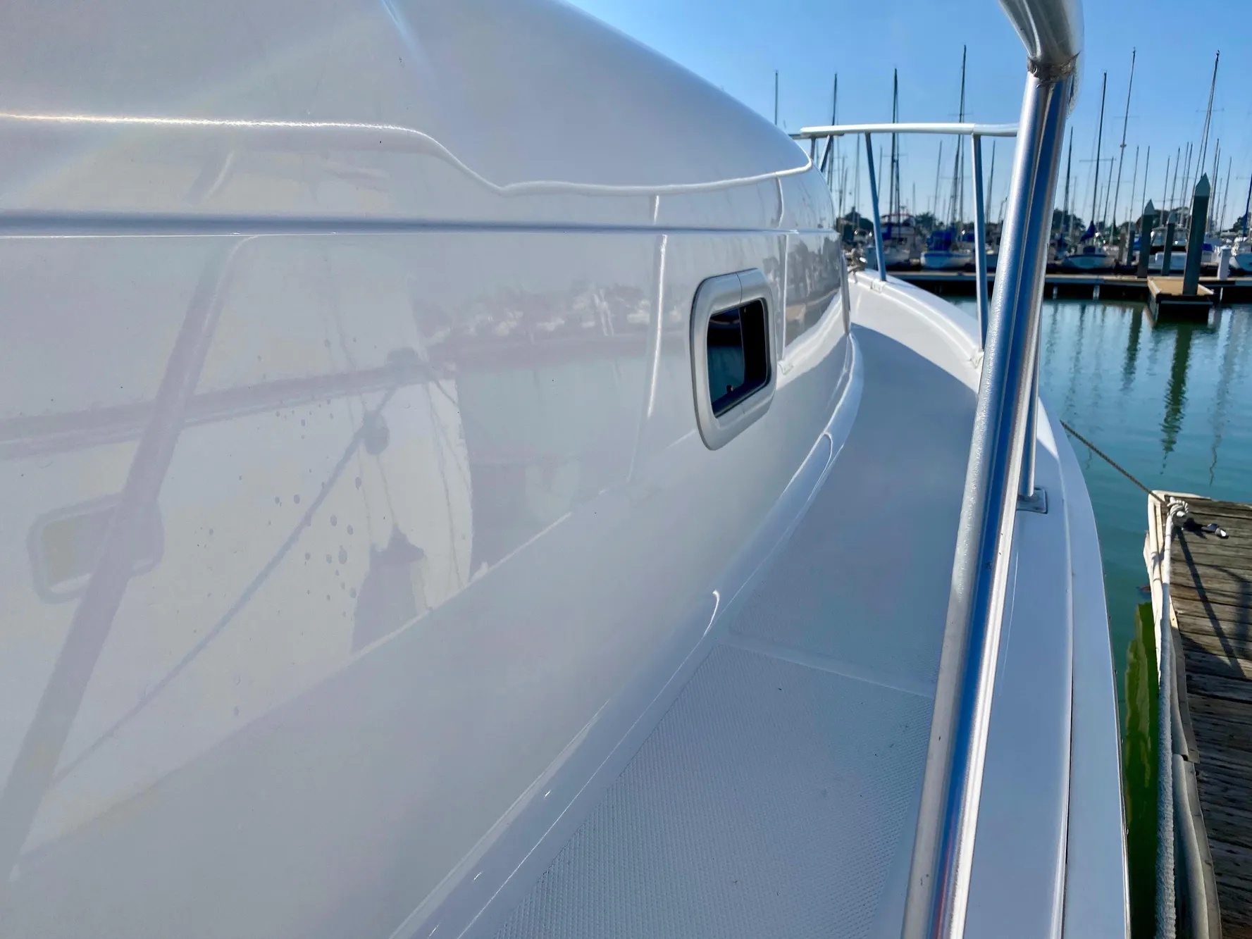 2000 Mainship Pilot 34 docked, side view.