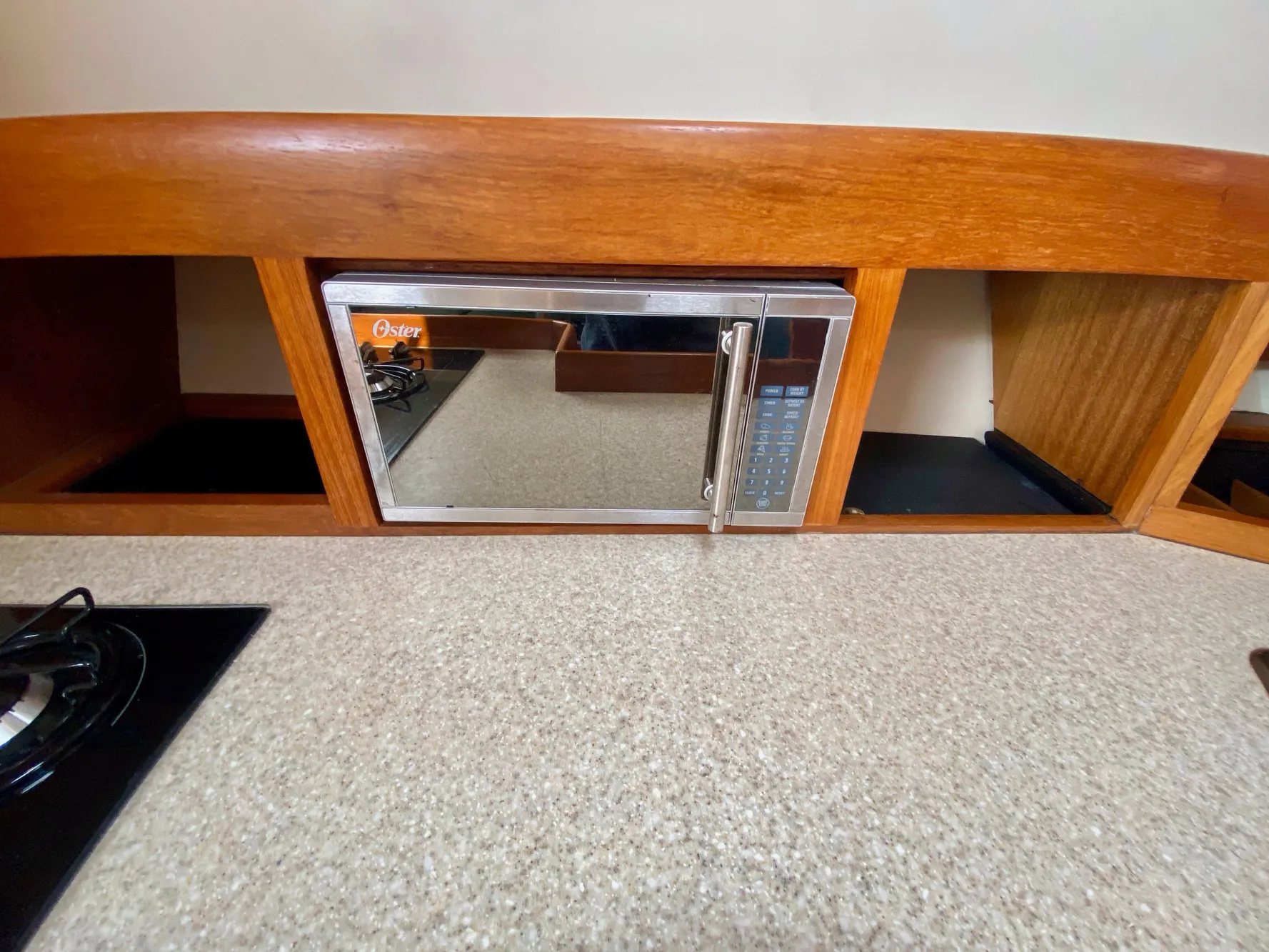 Mainship Pilot 34 kitchen area with microwave, year 2000.