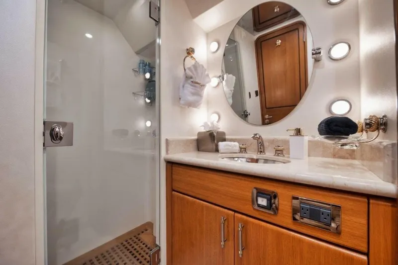Island Girl Yacht Photos Pics Luxurious bathroom on 2002 Westport 112 yacht with elegant fixtures and modern amenities.