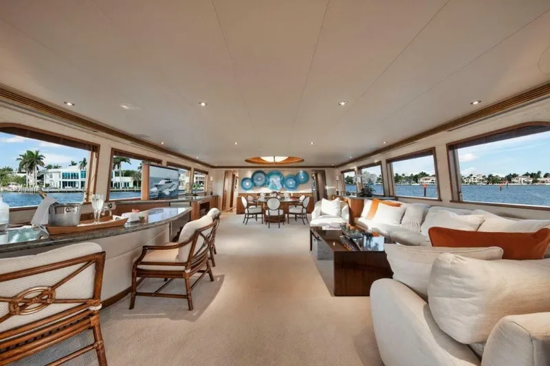 Island Girl Yacht Photos Pics Luxurious interior of 2002 Westport 112 yacht with elegant seating and panoramic windows.