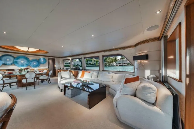 Island Girl Yacht Photos Pics Luxurious interior of 2002 Westport 112 yacht with elegant seating and dining area.