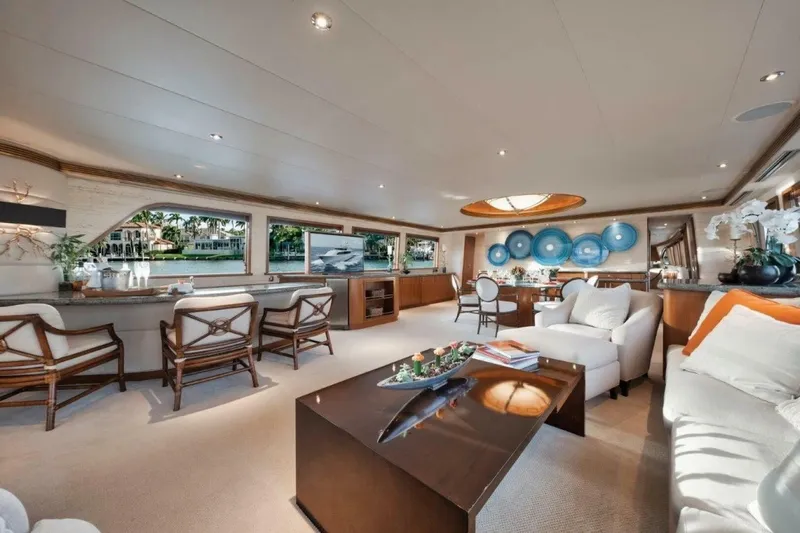 Island Girl Yacht Photos Pics Luxurious interior of 2002 Westport 112 yacht with elegant seating and decor.