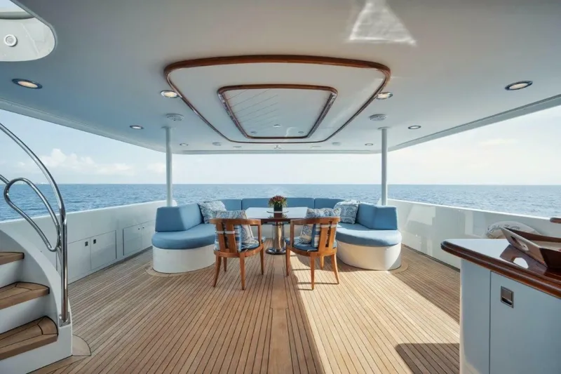 Island Girl Yacht Photos Pics Luxurious 2002 Westport 112 yacht deck with elegant seating and ocean view.