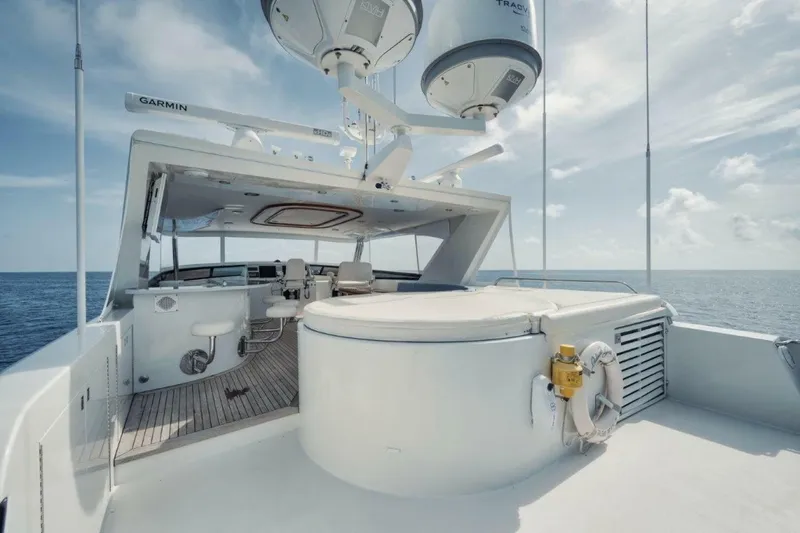 Island Girl Yacht Photos Pics Luxurious 2002 Westport 112 yacht deck with navigation equipment and ocean view.