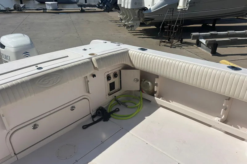  Yacht Photos Pics 2004 Grady-White Marlin 300 boat interior with storage and utility features.