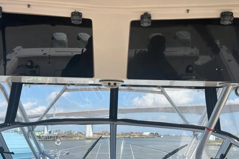  Yacht Photos Pics 2004 Grady-White Marlin 300 boat interior with ocean view through windshield.