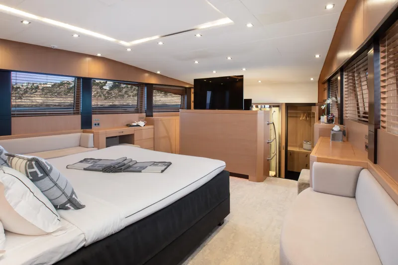 My Mr J Yacht Photos Pics Luxurious interior of 2006 ISA 120 yacht with modern furnishings and elegant design.