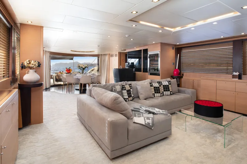 My Mr J Yacht Photos Pics Luxurious interior of 2006 ISA 120 yacht with elegant furnishings and ocean view.