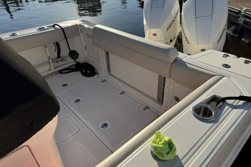  Yacht Photos Pics 2023 Boston Whaler 250 Outrage boat interior with dual Mercury engines.