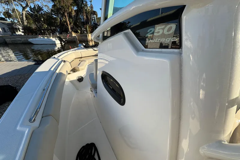  Yacht Photos Pics 2023 Boston Whaler 250 Outrage boat interior, showcasing sleek design and spacious seating.