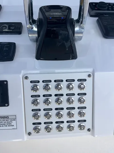 Agitator Yacht Photos Pics Control panel of a 2016 Intrepid 327 Center Console boat with Yamaha throttle.