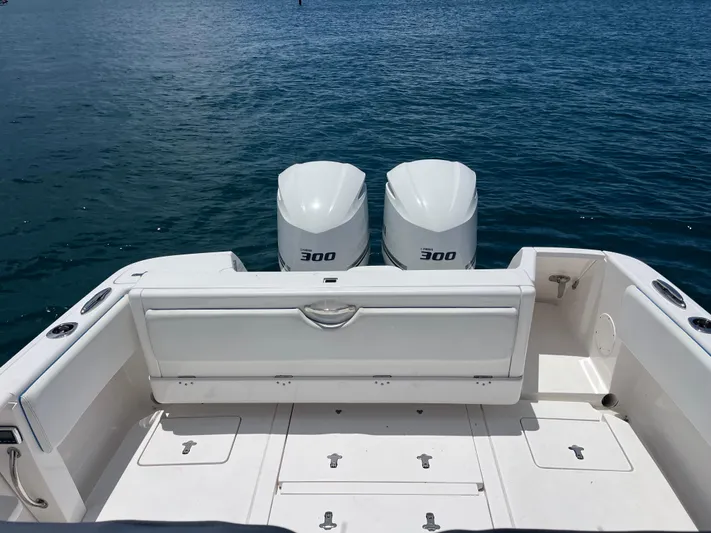 Agitator Yacht Photos Pics 2016 Intrepid 327 Center Console boat with twin 300 horsepower engines on open water.