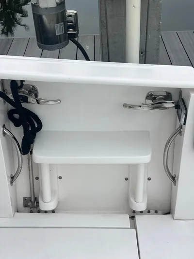 Agitator Yacht Photos Pics 2016 Intrepid 327 Center Console boat stern with cleats and step.