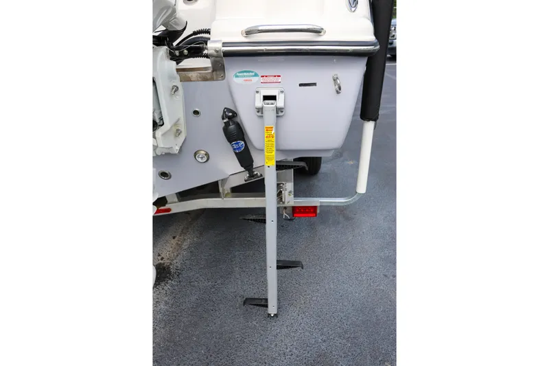  Yacht Photos Pics 2023 Key West 263 FS boat with a mounted boarding ladder on the stern.