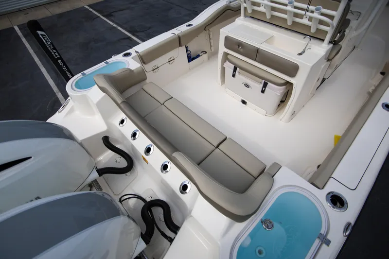  Yacht Photos Pics 2023 Key West 263 FS boat interior with seating, storage, and twin engines.