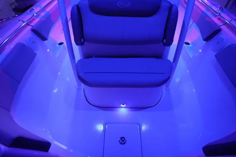  Yacht Photos Pics 2023 Key West 263 FS boat interior with blue ambient lighting.