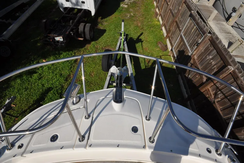  Yacht Photos Pics 2020 Sea Ray Sundancer 320 bow view with railing and trailer.