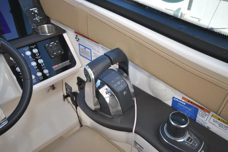  Yacht Photos Pics 2020 Sea Ray Sundancer 320 helm controls with steering wheel and throttle.