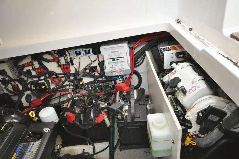  Yacht Photos Pics Engine compartment of 2020 Sea Ray Sundancer 320, showcasing wiring and components.