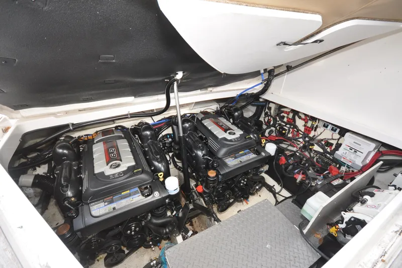  Yacht Photos Pics Engine compartment of 2020 Sea Ray Sundancer 320, featuring dual engines and wiring.