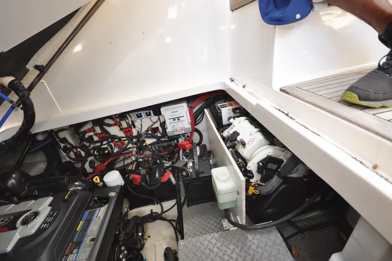  Yacht Photos Pics Engine compartment of 2020 Sea Ray Sundancer 320, showcasing wiring and mechanical components.