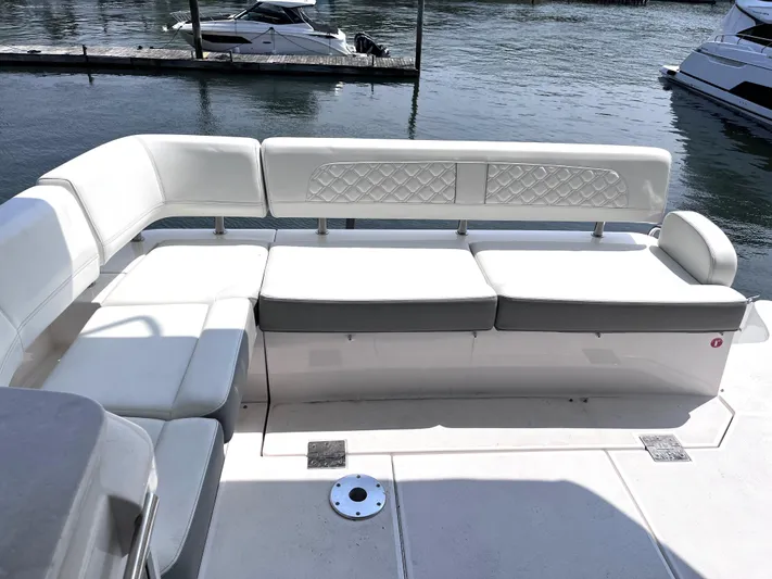  Yacht Photos Pics Luxurious seating area on a 2022 Regal 42 Grande Coupe yacht.