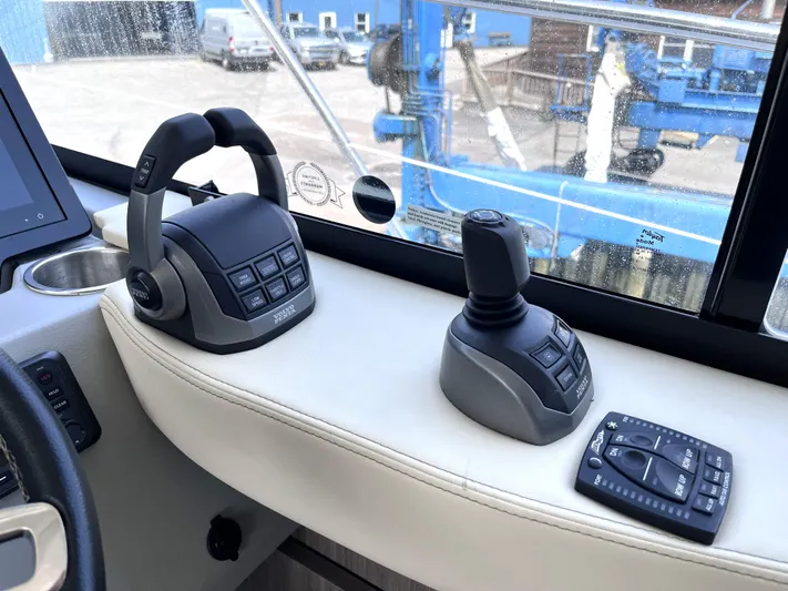  Yacht Photos Pics Control panel of a 2022 Regal 42 Grande Coupe yacht.