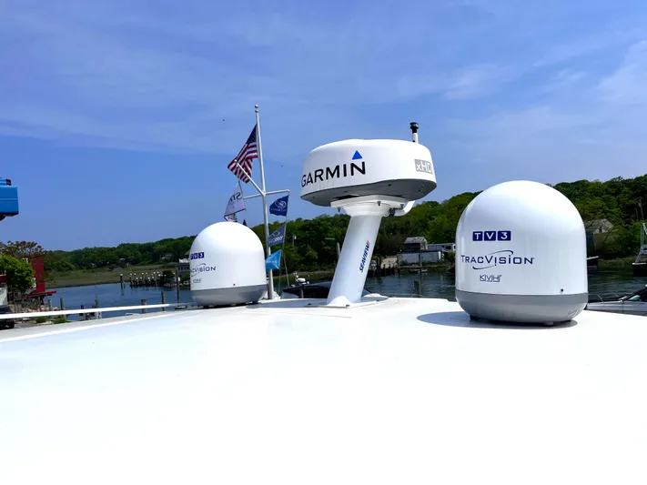  Yacht Photos Pics 2022 Regal 42 Grande Coupe with Garmin and KVH TracVision equipment on deck.