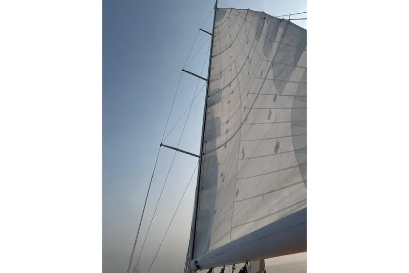 Serendipity II Yacht Photos Pics Sail of a 1999 Sabre 452 yacht against a clear blue sky.