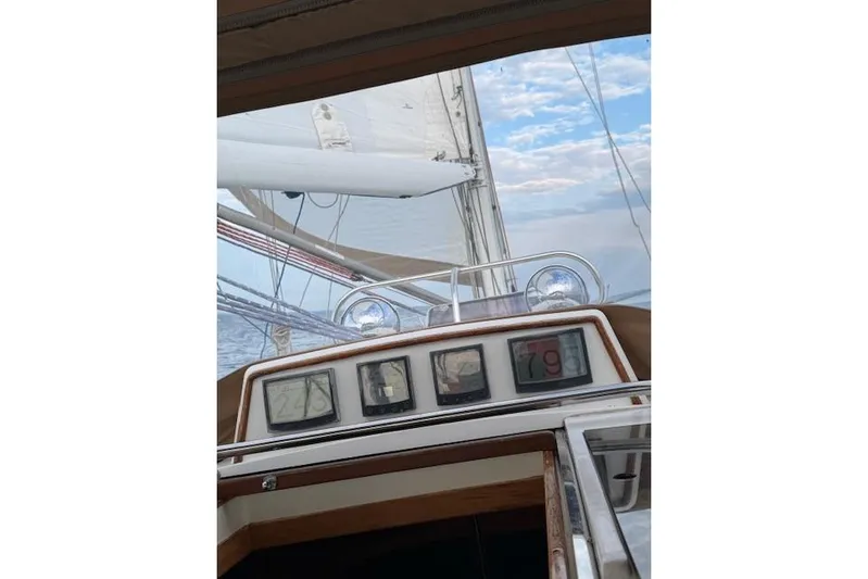 Serendipity II Yacht Photos Pics Sailing view from 1999 Sabre 452 yacht cockpit, showcasing instruments and sails.