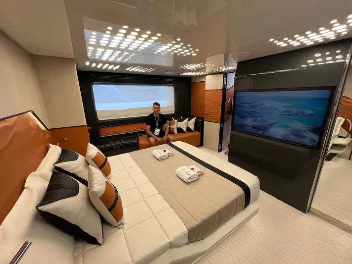  Yacht Photos Pics Luxurious interior of 2025 Astondoa 677 Coupe yacht with modern bedroom design.