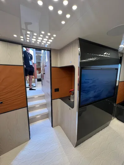  Yacht Photos Pics Interior of 2025 Astondoa 677 Coupe yacht with modern design and ambient lighting.