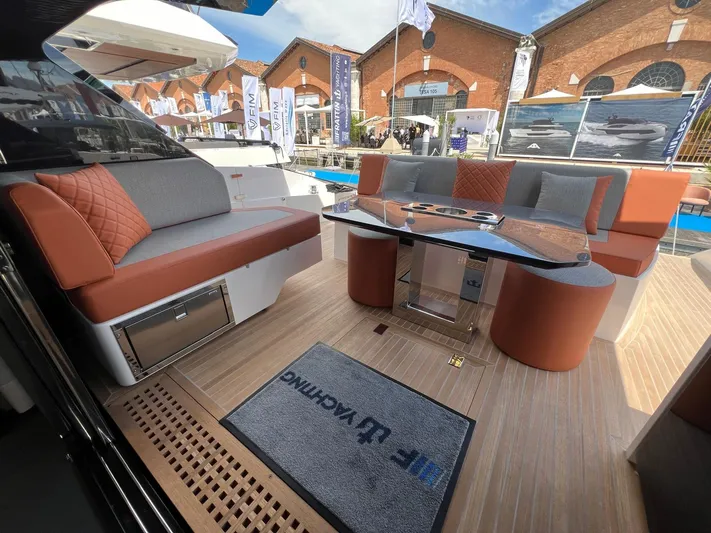 Yacht Photos Pics Luxurious interior of 2025 Astondoa 677 Coupe yacht with elegant seating and modern design.