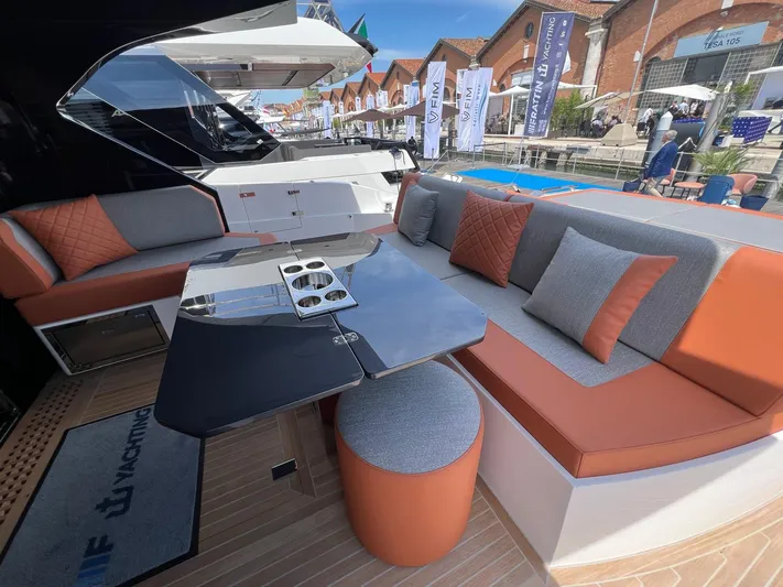  Yacht Photos Pics 2025 Astondoa 677 Coupe yacht interior with modern seating and sleek design.