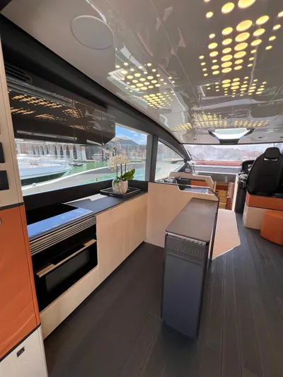  Yacht Photos Pics Luxurious interior of 2025 Astondoa 677 Coupe yacht with modern design and sleek finishes.