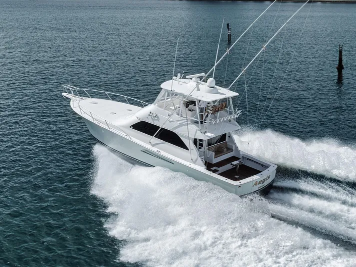 Aegis Yacht Photos Pics 2009 Viking 54 Convertible yacht cruising on open water.